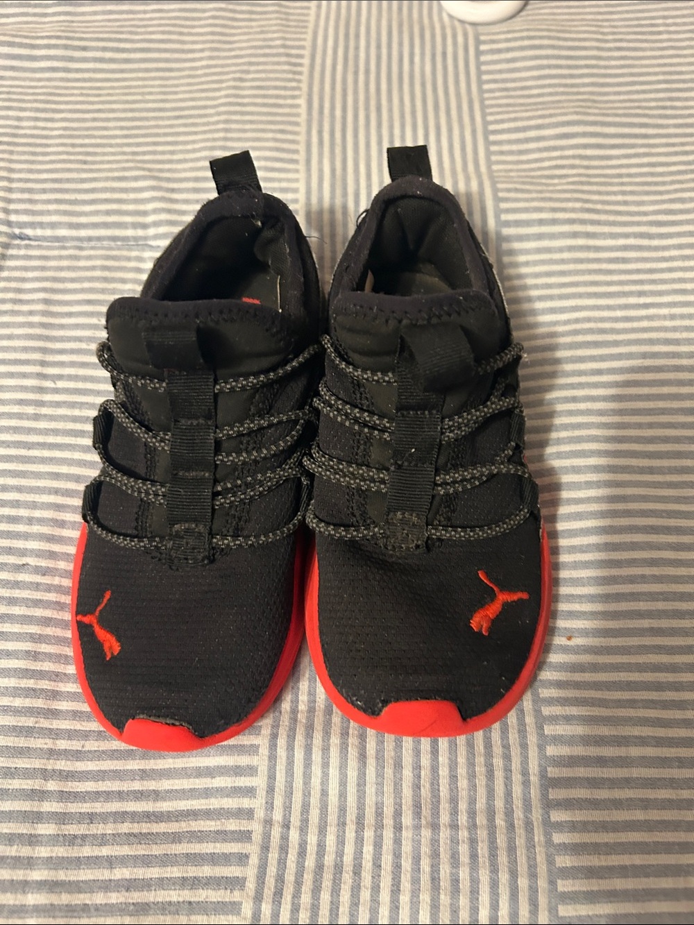 Puma Kids Black Sneakers with Red Accents